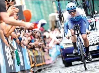  ?? — AFP photo ?? Yates competes during the second stage of the Giro d’Italia 2022 cycling race, a 9.2 kilometers individual time trial in Budapest, Hungary.