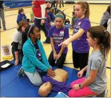  ?? AIDAN’S HEART FOUNDATION FACEBOOK ?? Aidan’s Heart Foundation trained more than 1,000 Marsh Creek Sixth Grade Center students how to perform hands-only CPR. Many of the medical volunteers are from Chester County Hospital. This year Downingtow­n Middle School students, who earned their CPR...