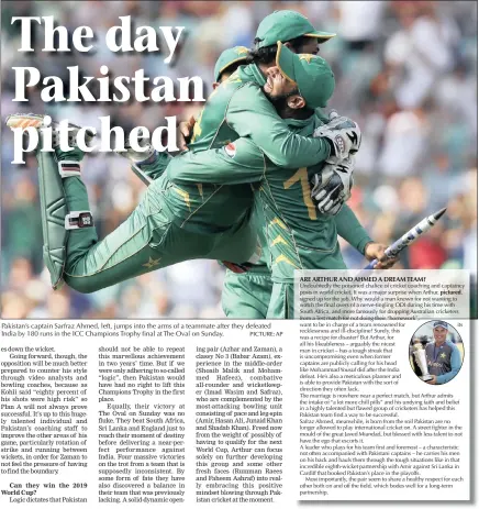  ?? PICTURE: AP ?? Pakistan’s captain Sarfraz Ahmed, left, jumps into the arms of a teammate after they defeated India by 180 runs in the ICC Champions Trophy final at The Oval on Sunday.