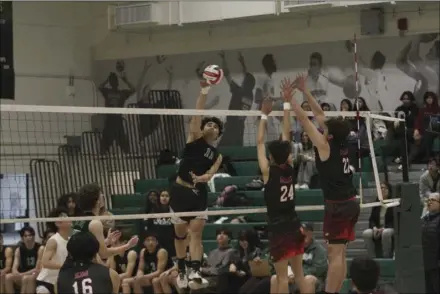  ?? Justin Vigil-zuniga/ The Signal ?? Granada Hills Charter High School senior Brando Serpas (11) tries to get a hit past a couple of Hart blockers during Friday’s non-league matchup at Granada Hills Charter High School.