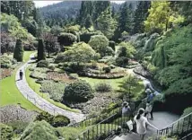  ?? Daniel A. Anderson ?? A VISIT to Butchart Gardens tops the to-do list for many visitors to Victoria, Canada. Its sunken garden was once a quarry.