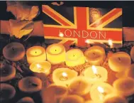  ?? AP ?? A vigil at Trafalgar Square on Wednesday night.