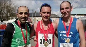  ??  ?? 10K winners: Iosif Guther (2nd), Niall Sheil (1st) and Paul Gibbons (3rd).