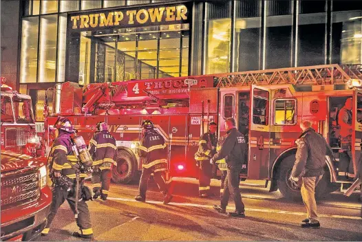  ??  ?? BRAVEST RESPONDERS: Firefighte­rs arrive at Trump Tower Saturday evening to put out a fatal blaze some 500 feet above tony Fifth Avenue.