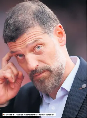  ??  ?? Slaven Bilic faces another relentless fixture schedule