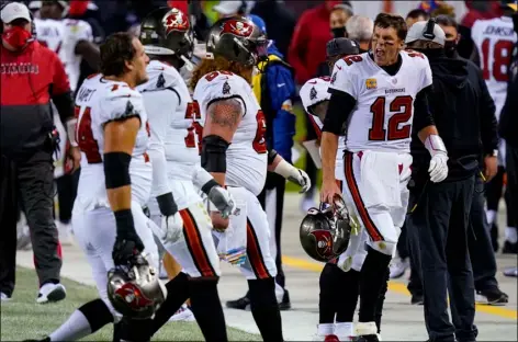  ?? AP PHOTO/CHARLES REX ARBOGAST ?? Tampa Bay Buccaneers quarterbac­k Tom Brady (12) yells at members of his offensive line as they walk off the field during the second half of an NFL football game against the Chicago Bears in Chicago, Oct. 8.