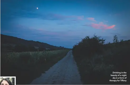  ??  ?? Drinking in the beauty of a night sky is a form of therapy for Tiffany