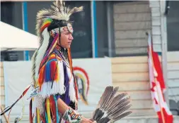  ?? CHRISSY ISAACS ?? Grass dancer Darcy Williamson performs at the Iskatewiza­agegan First Nation (Shoal Lake 39) summer powwow in August. “When people see me, I don’t want them to see someone poisoned by mercury. I want them to see a culturally oriented community member.”