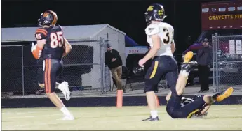  ?? Westside Eagle Observer/MIKE ECKELS ?? Leaving behind the last Tiger defender, Cordell Donnell crosses the goal line for the Lions’ first touchdown. The Tigers claimed the victory, 44-16, over the Lions.