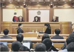  ??  ?? 0 Judges at the trial of impeached president Park Geun-hye