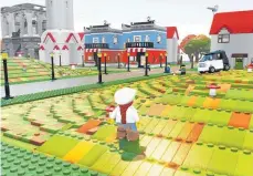  ?? FOTO: WARNER BROS/DPA-TMN ?? Das Spiel „Lego World“bringt die berühmten dänischen Bausteine in digitaler Form auf den Fernsehsch­irm.