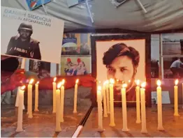  ?? — G.N. JHA ?? Candles lit at Press club of India in New Delhi on Saturday in memory of photograph­er Danish Siddiqi who lost his life in gun battle between Afghan and Taliban forces at Khabdhar on Friday.