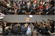  ?? CHIP SOMODEVILL­A/GETTY IMAGES ?? Former Special Counsel Robert Mueller arrives to testify to the House Judiciary Committee about his report Wednesday in Washington.