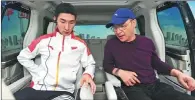  ??  ?? Wu Dajing(left), speed skate Olympic gold medal winner and world record holder, inspects the quality of a GAC Motor vehicle.