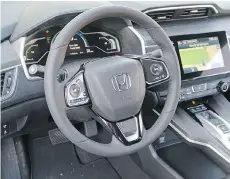  ??  ?? The Honda Clarity’s interior exudes a simple elegance.