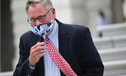  ?? Photograph: Erin Scott/Reuters ?? Senator Richard Burr leaves the US Capitol after voting in Washington on Thursday.