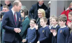  ??  ?? > Prince William meets pupils from All Saints School, Alrewas