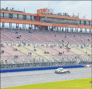  ?? Greg Beacham The Associated Press ?? Drivers cherish the 2 miles of grip and space available at Auto Club Speedway’s racetrack in Fontana, Calif.