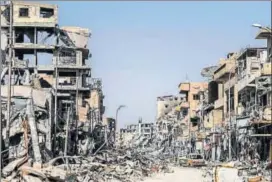  ?? AFP ?? Heavily damaged buildings in Raqqa, after the Islamic State was expelled from the Syrian city.