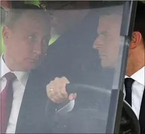  ??  ?? Vladimir Poutine et Emmanuel Macron à Versailles en mai 2017.