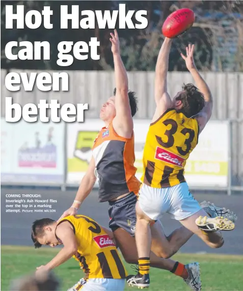  ?? Picture: MARK WILSON ?? COMING THROUGH: Inverleigh’s Ash Howard flies over the top in a marking attempt.