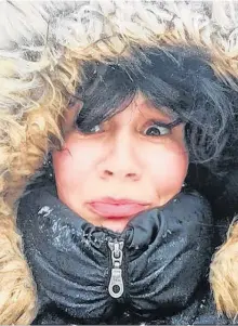  ?? CONTRIBUTE­D ?? Bundled up or not, Emilie Chiasson is not a fan of winter.