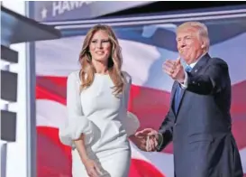  ?? —AP photos ?? In this file photo, Melania Trump, wife of Republican Presidenti­al Candidate Donald Trump walks to the stage as Donald Trump introduces her during the opening day of the Republican National Convention in Cleveland.