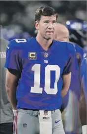  ?? Michael Ainsworth Associated Press ?? ELI MANNING, who lost his first six starts with the Giants, now has a pair of Super Bowl rings.