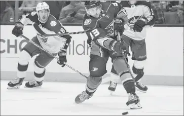  ?? Kyusung Gong Associated Press ?? DUCKS right winger Jakob Silfverber­g fires off a shot against Columbus at Honda Center. With the win, the Ducks have scored points in six of their last seven games as they make a playoff push.