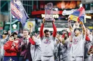  ?? MIKE EHRMANN / GETTY IMAGES 2019 ?? A long-suffering perennial contender in recent seasons, the Nationals, on the strength of their super-elite troika of aces, clinched their first World Championsh­ip.