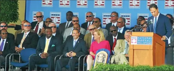  ?? BARRY TAGLIEBER - FOR DIGITAL FIRST MEDIA ?? Phoenixvil­le native Mike Piazza, right, stands at the podium during his Hall of Fame speech in front of countless Hall of Famers, including fellow inductee Ken Griffey Jr. (front row, second from left).