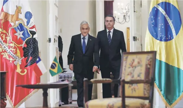  ??  ?? El Presidente Piñera recibió a las 11.05 horas de ayer a su par de Brasil, Jair Bolsonaro, en La Moneda.