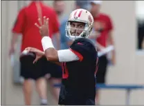  ?? Bay Area News Group/tns ?? San Francisco 49ers quarterbac­k Jimmy Garoppolo throws a pass during a combined NFL football training camp with the Denver Broncos at the Broncos’ headquarte­rs Friday.