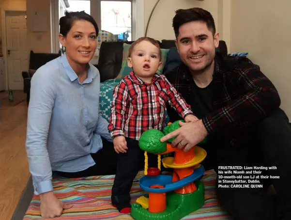  ??  ?? FRUSTRATED: Liam Harding with his wife Niamh and their 10-month-old son LJ at their home in Stoneybatt­er, Dublin. Photo: CAROLINE QUINN