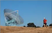  ?? STAFF FILE PHOTO ?? A runner goes along the Stanford Dish trail in the Palo Alto foothills behind Stanford University in July 2012.