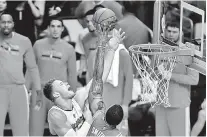  ??  ?? Blake Griffin of the Los Angeles Clippers (L) is blocked by Josh Smith of the Houston Rockets shoot during game six in the second round of the western conference playoffs at Staples Center in Los Angeles, California, The Rockets went on to win 119-107....