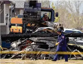  ?? Matthew Jonas / Longmont Times-Call ?? Debris is removed April 18 from a house that was destroyed a day earlier in a deadly explosion in Firestone, Colo.