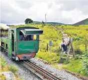  ??  ?? The Welsh Highland Railway at Llanberis, left