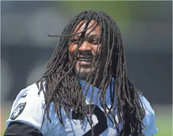  ?? KIRBY LEE, USA TODAY SPORTS ?? “We know what the struggle is,” Marshawn Lynch says of growing up in Oakland.