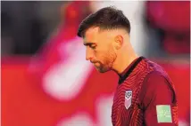  ?? FRANK GUNN/THE CANADIAN PRESS VIA AP ?? United States’ Matt Turner (1) walks off the pitch following the team’s loss to Canada at the end of the second half of a World Cup soccer qualifier in Hamilton, Ontario on Sunday.