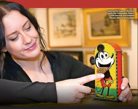  ?? ?? Saleroom’s Lauren Reveley with the moneybox. Right, the back of the tinplate Mickey Mouse moneybox