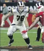  ?? Rick Scuteri Associated Press ?? RODGER SAFFOLD of the Rams owns a profession­al team, Rise Nation, that competes in video game tournament­s.