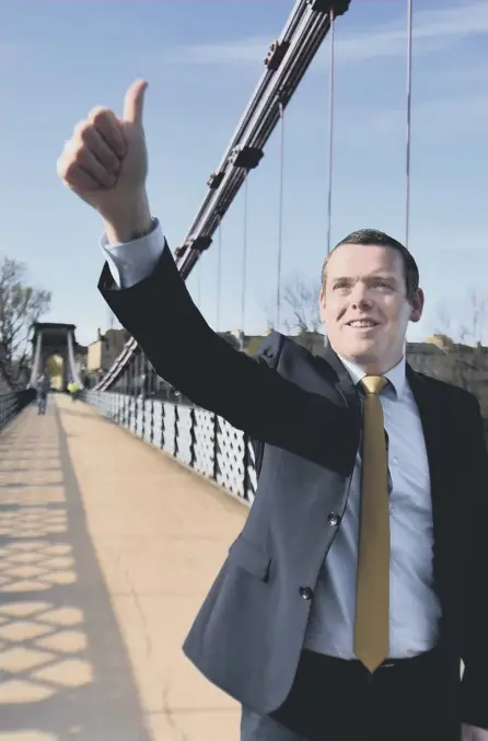  ??  ?? 2 Scottish Conservati­ve leader Douglas Ross on the election campaign trail
