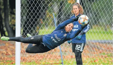  ?? AP ?? Argentine women’s soccer team goalkeeper Vanina Correa catches the ball as she trains with fellowgoal­keeper Gabriela Garton ahead of the FIFA Women’s World Cup France 2019 tournament.