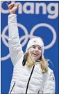  ?? Javier Soriano AFP/Getty Images ?? ESTER LEDECKA of the Czech Republic exults after her stunning gold in the super-G.