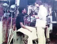  ??  ?? Perry Henzell on set with Jimmy Cliff, 1972.