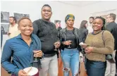  ?? Picture: MARK WEST ?? ARTY CHEERS: At the Fluid exhibition held at the Nelson Mandela University’s Bird Street gallery last week were, from left, Nasiphi Dandala, Bulumko Tshaka, Thulwana Thabata and Ntabozuko Madwe