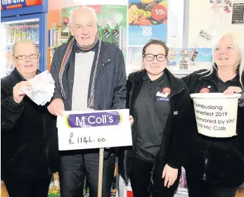  ??  ?? Fundraiser­s Jan Russell, Sophie Simpson and Debbie Hickey hand over the cheque to John Edgar