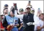  ?? PETER MORRISON — THE ASSOCIATED PRESS ?? Tiger Woods prepares to tee off on the seventh hole during a practice round for the British Open on July 11.