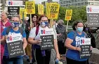  ?? ?? DAPPER Leslie Phillips
FURIOUS Nurses on a protest march